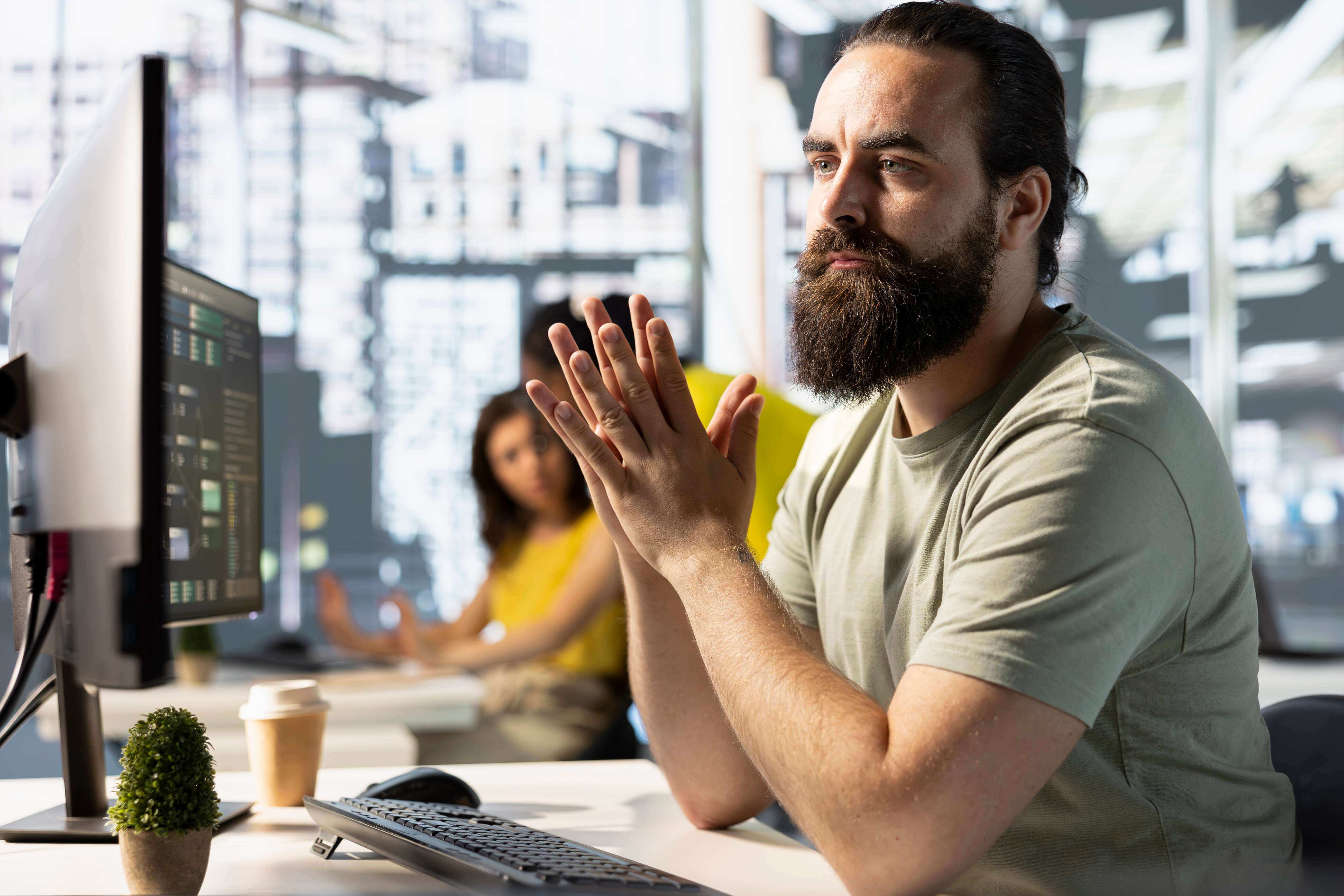 How to Hire a SaaS Developer Strategy Discussion at work led by the Hiring Manager
